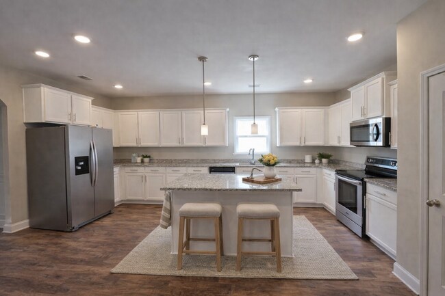 Building Photo - Get ready to fall in love—this sleek, modern beauty in West Creek Farms is bringing the wow facto...