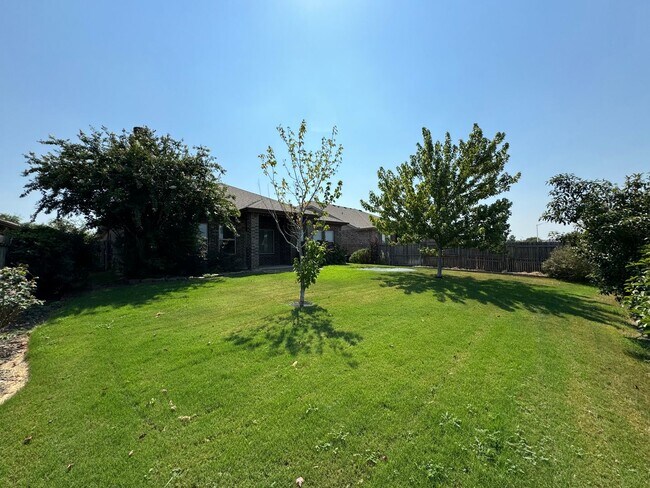Building Photo - Argyle ISD Gem with Huge Private Backyard & Open Floorplan