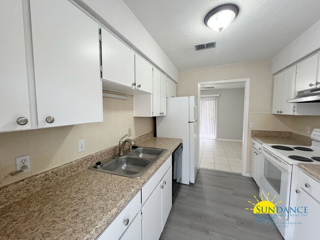 Building Photo - Spacious 3-Bedroom Condo with Community Am...