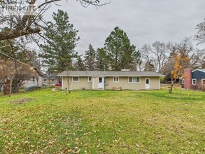 Building Photo - Spacious 4-Bedroom Apartment Just 4 Blocks from MSU!