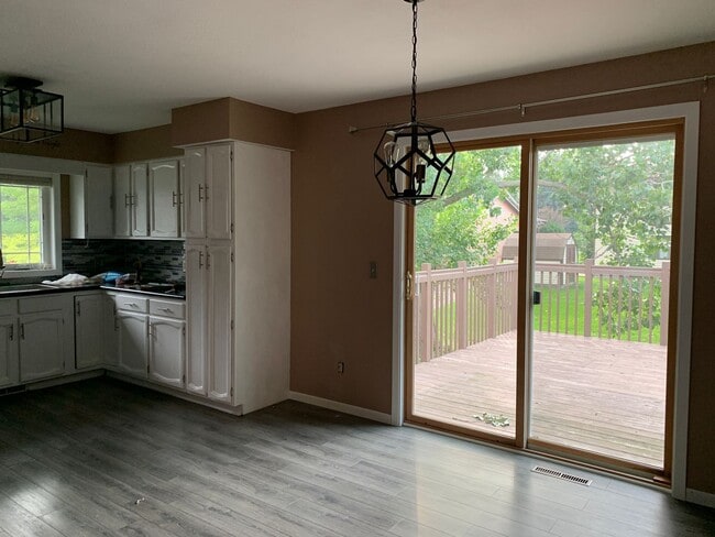 Building Photo - Beautifully Landscaped Split-Level Home