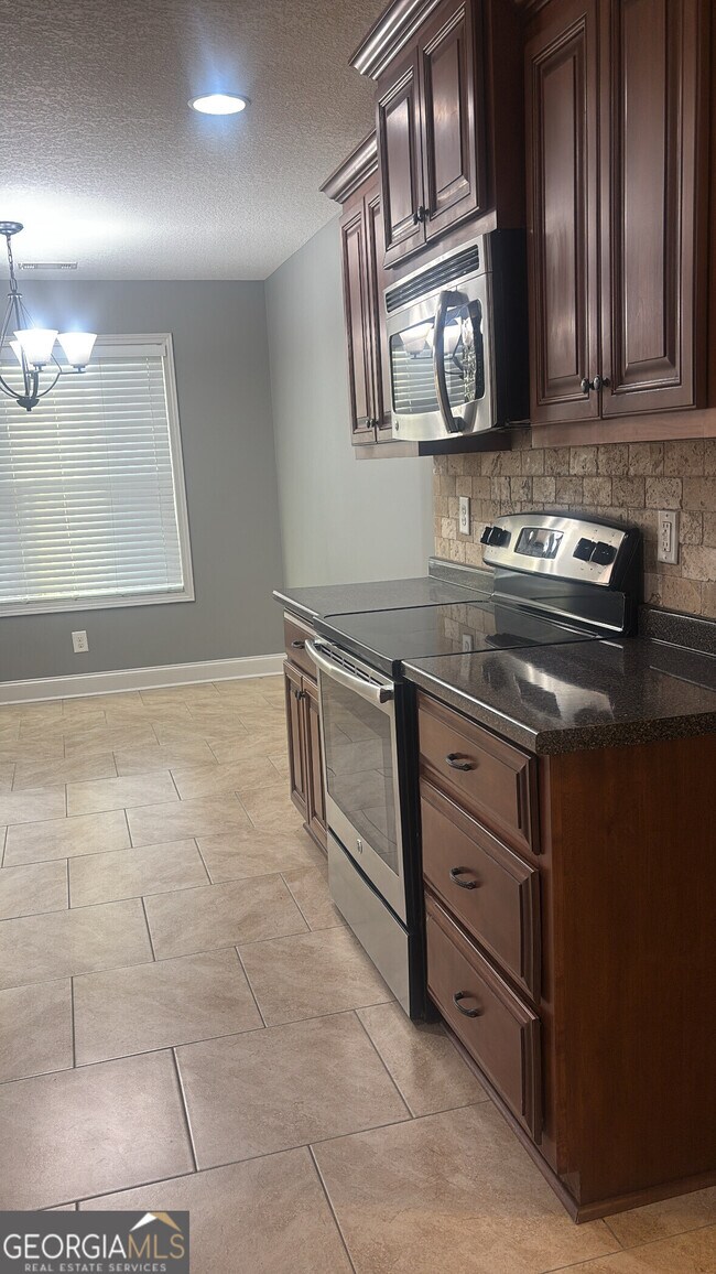 Building Photo - 303 S Charity Ln