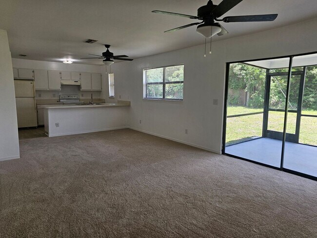 Building Photo - Freshly painted and brand new carpet/laminate 2 bed 2 bath 1 car garage single family home!!!