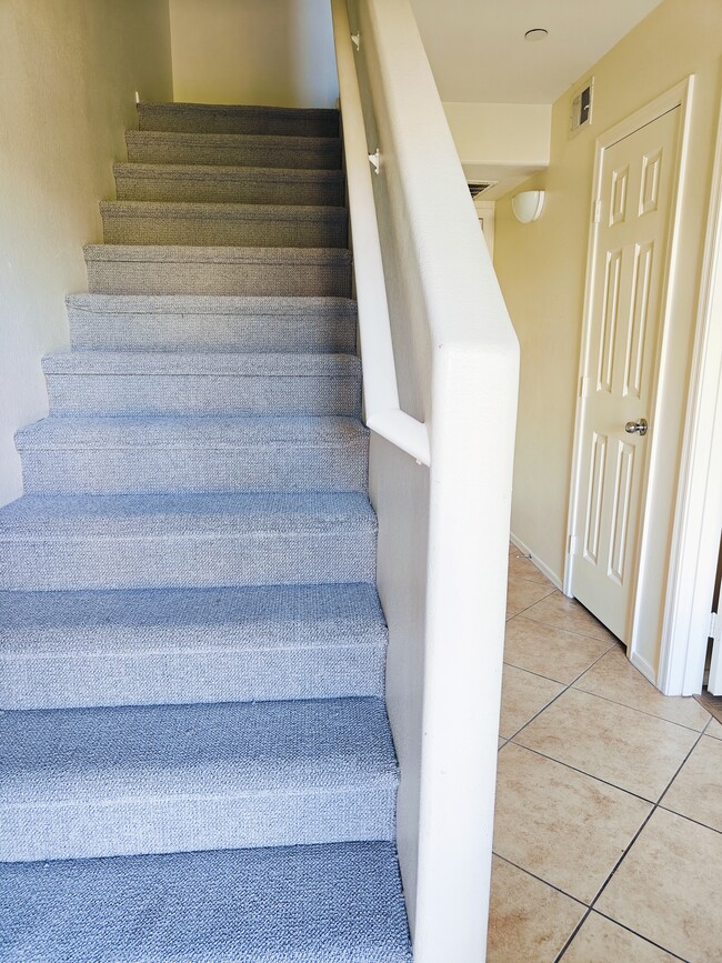 Stairs with new carpet - 900 S 94th St