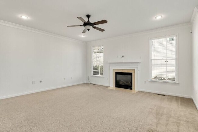 Building Photo - Spacious 5 Bedroom Home with 3rd Floor Suite, Fenced Yard & Community Amenities – $3,500/mo