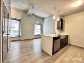 Building Photo - 306 E. 12th St.-203