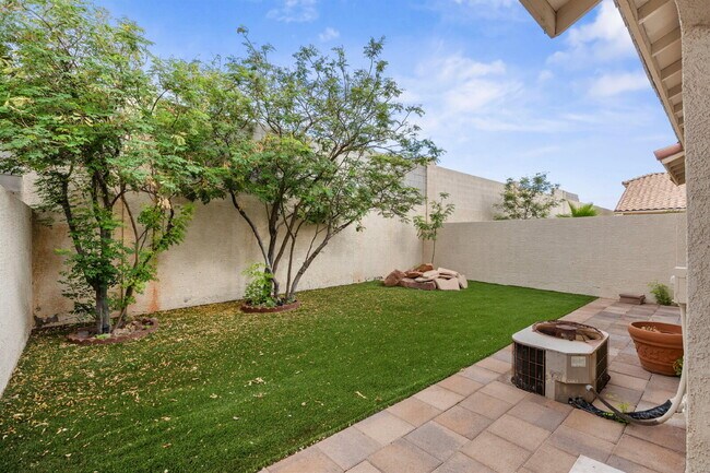 Building Photo - Charming and spacious single-story townhome nestled within a gated community in the desirable Nor...