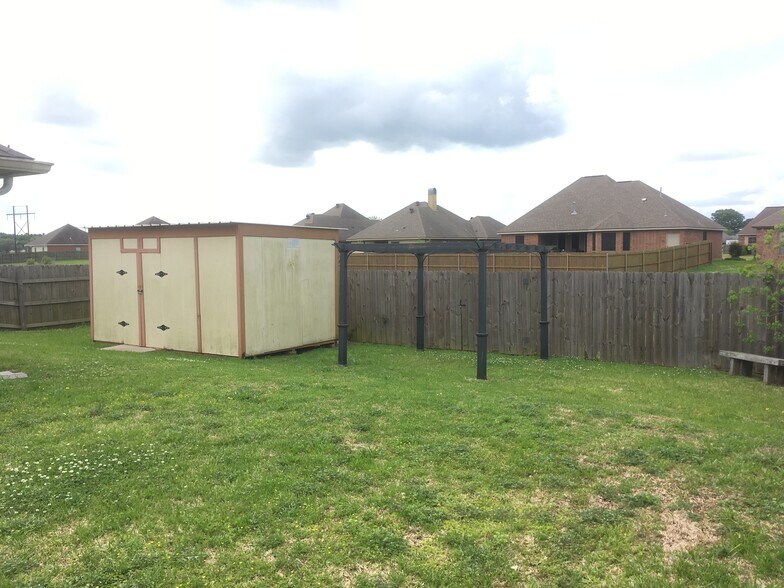 Backyard w/ Storage Building - 108 Smalley Rd