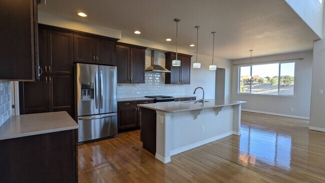 Building Photo - FOUR BED/3 BATH PRAIRIE STYLE HOME WITH GOURMET KITCHEN IN CORDERA NEIGHBORHOOD!