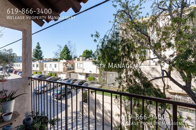 Building Photo - 2 bed 1 bath Sunny top floor end unit in G...