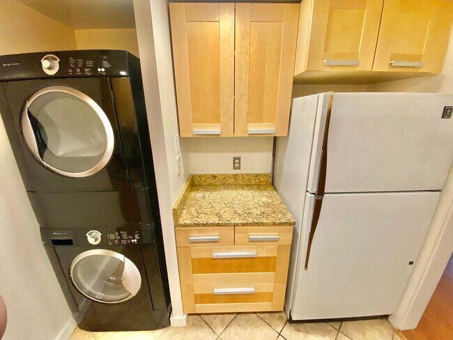 Building Photo - SAVE OVER $200!* Dupont Circle 1 Bedroom Charmer with Patio, Fireplace, Central Air, Washer/Dryer!