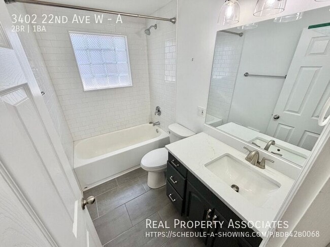 Building Photo - 3402 22nd Ave W