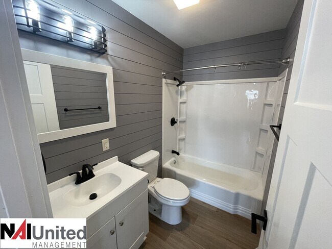 Building Photo - Three bed, one and a half bath home for rent