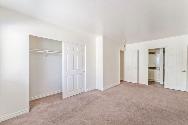 Building Photo - Guard-Gated Condo Living with Resort-Style Community Amenities!