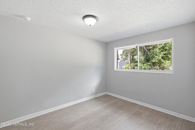 Building Photo - 7386 Dostie Dr E