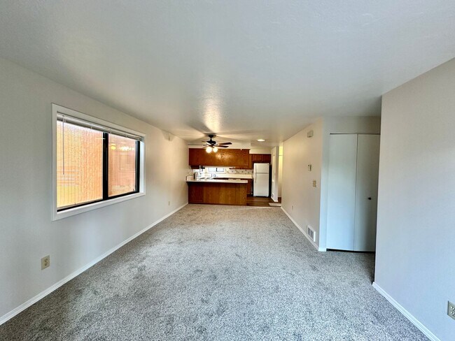 Building Photo - For Rent: Cozy 2 Bed / 2 Bath Condo with Enclosed Yard & Detached Garage