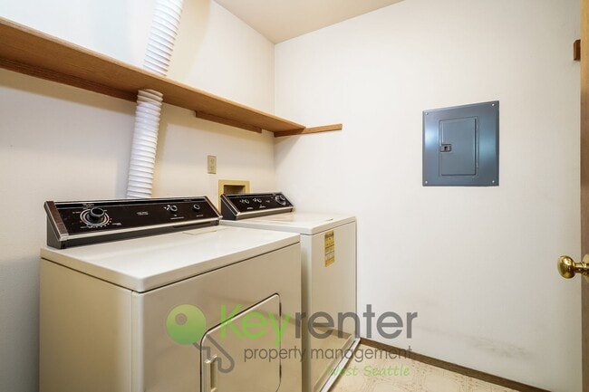 Building Photo - **Rent Special** Remodeled Two-Bedroom with Open Floor Plan, Parking, and Easy Transit Access