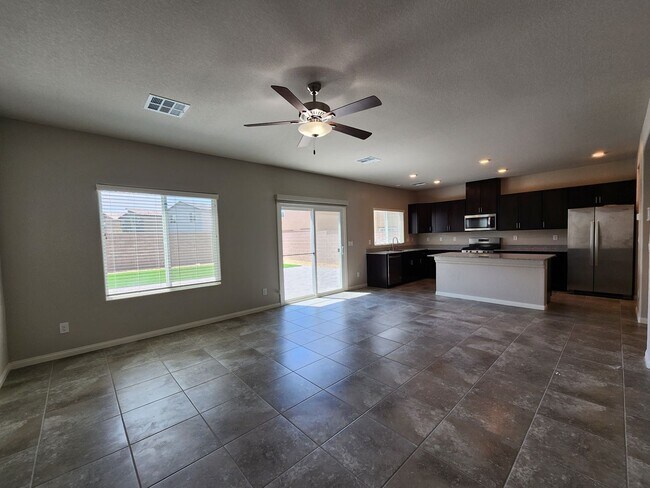 Building Photo - A Fairly New Home with 5 Bedrooms in a gated community