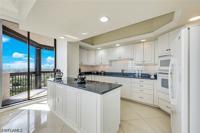 Building Photo - 6001 Pelican Bay Blvd