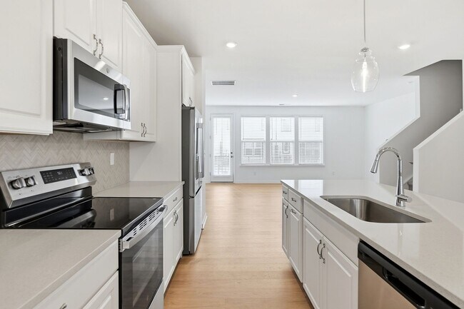Building Photo - Brand-New Townhome in the University area at Senata at Research Park!