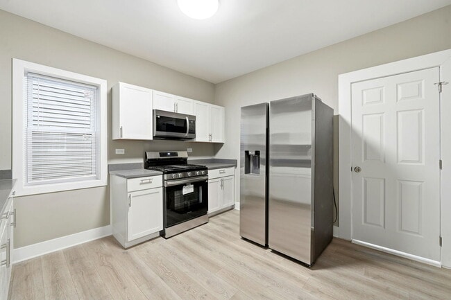 Building Photo - 1217 N Harding Ave