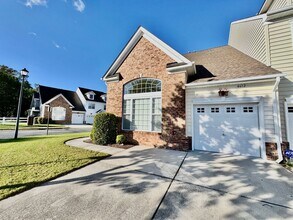 Building Photo - READY NOW!! End-Unit Loft-Style Condo w/1s...