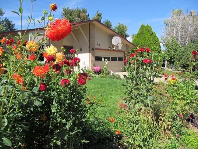 Front yard flower gardens and house - 28 James Circle