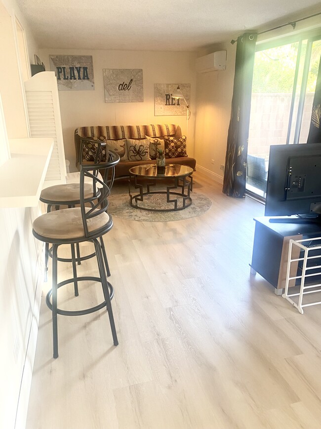 Living room, new flooring. - 6308 Vista del Mar