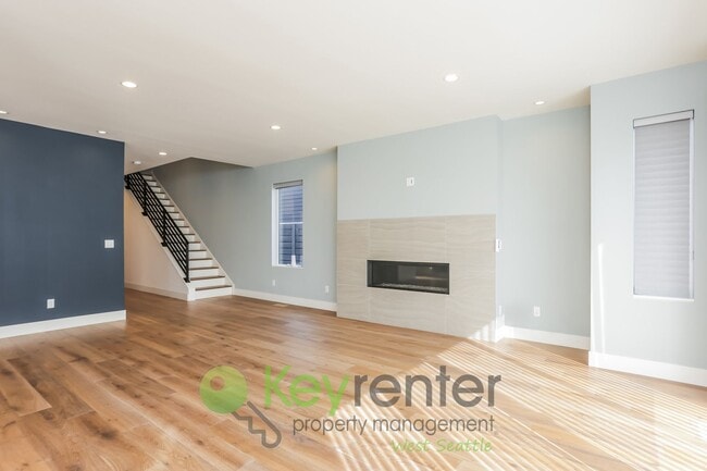 Building Photo - Spacious Living with Balconies, Deck, and Private Yard