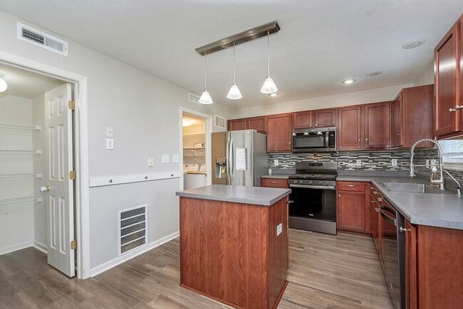 Building Photo - 4 Bedroom Home With Pond View in Top Rated...