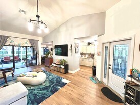 living room - 9366 Chelsea Dr N