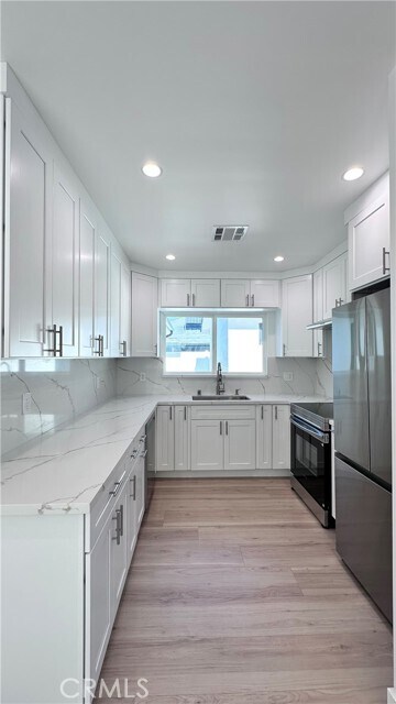 Building Photo - 2135 N Brighton St #102