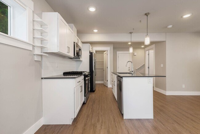 Building Photo - Modern 2 Bedroom Maple Leaf Living with Stylish Finishes & Flexible Living Space