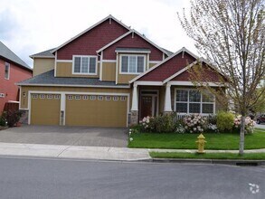 Building Photo - Beautiful 5 + bedroom home - In much desir...