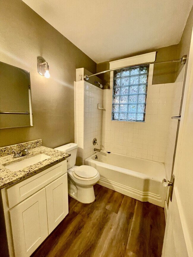 Building Photo - This beautiful 3-bedroom (2 conforming and...
