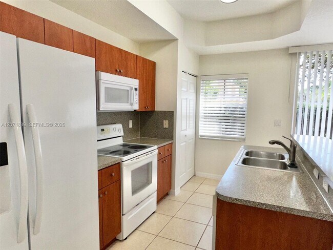 Building Photo - 4974 White Mangrove Way E
