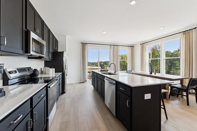 Building Photo - New Construction 4BD, 3.5BA End Unit Raleigh Townhome with Easy Access to Downtown Raleigh