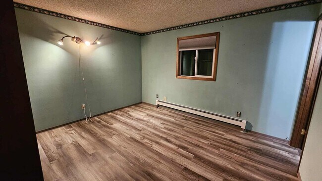 Building Photo - Beautiful House with 2 Wood Stoves across from park in Kalispell