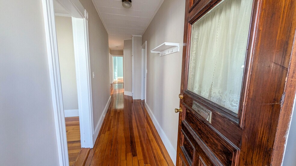 Well-laid-out hallway offering separation between living and sleeping areas - 37 Glover Ave