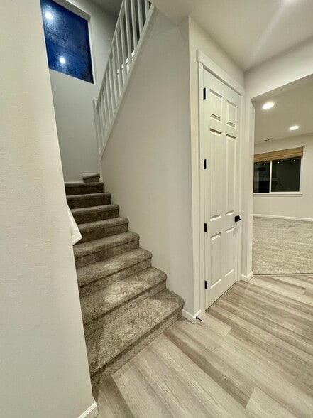Stairs and very large coat/storage closet - 6750 Skipper Ln SE