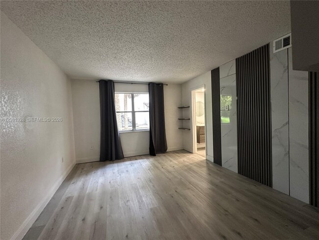 Building Photo - 4215 N University Dr