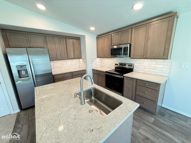 Building Photo - NEW Modern Townhouse with Two Car Garage i...