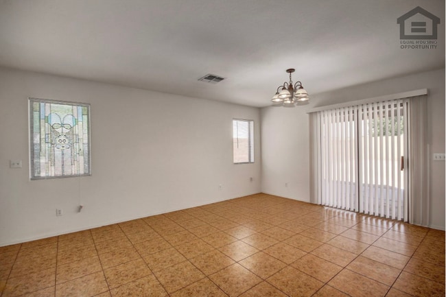 Building Photo - 7407 S Sunrise Way