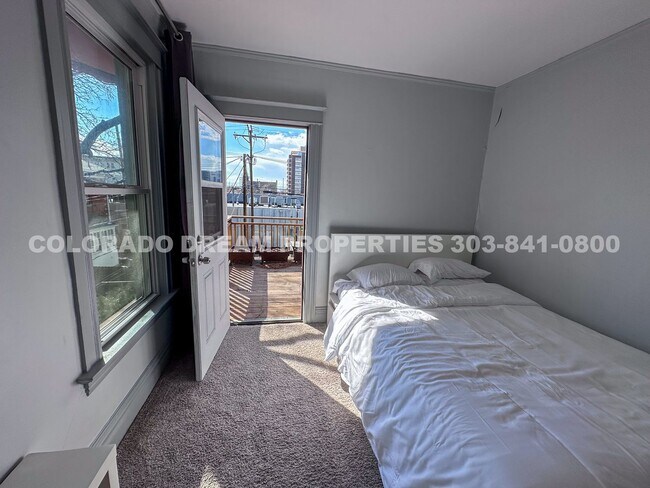 Building Photo - A home where old-world charm meets modern sophistication!