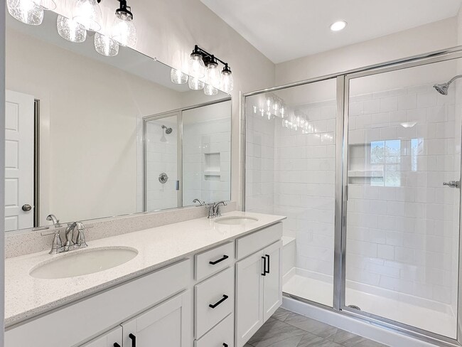 Building Photo - Beautiful, 3-Bedroom Midtown Nexton Townhome with Garage & Amenities