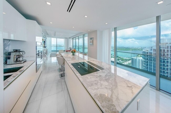 Building Photo - 10203 Collins Ave