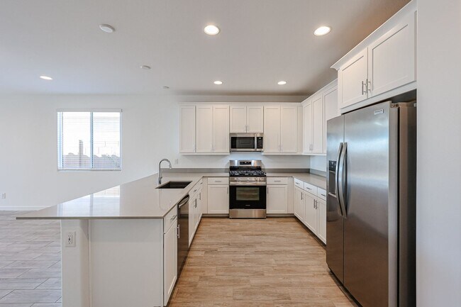 Building Photo - COMING SOON!! Recently built 5-Bedroom Home in Goodyear with Upgrades & Resort-Style Amenities