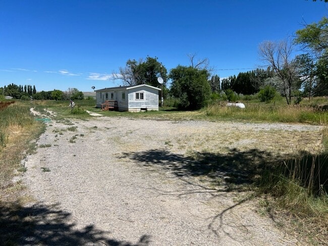 Building Photo - Semi-Rural 2 Bedroom 1 Bath Updated Mobile Home w/ Amenities