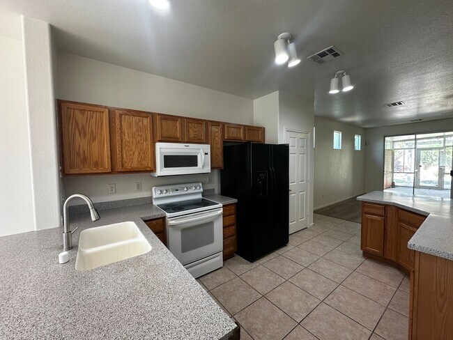 Building Photo - AUTUMN RIDGE AT SUMMERLIN-PHAS