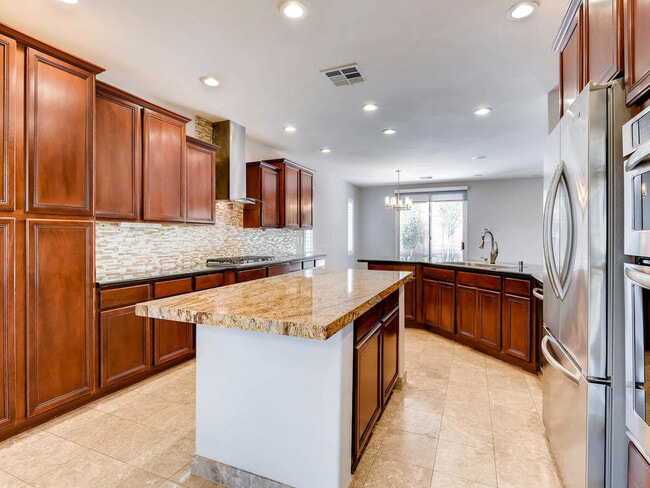 Building Photo - LUXURIOUS UPGRADED HOME IN A GATED SUMMERLIN AREA!!HOUSE HAS POOL AND SPA AND PATIO COVERED BACKY...